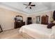 Main bedroom with king-size bed and ample furniture at 7457 Waterleaf Ct, Stanley, NC 28164