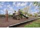 Community playground with playset and climbing equipment at 7457 Waterleaf Ct, Stanley, NC 28164