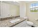 Bathroom with a vanity featuring granite countertops and modern fixtures, plus a toilet and mirror at 1034 Heath Helms Rd, Monroe, NC 28110