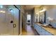 Spa-like bathroom with a walk-in shower and double vanity at 112 Noah Ln, Troutman, NC 28166