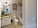 Clean bathroom with a shower/tub combo and modern fixtures at 112 Noah Ln, Troutman, NC 28166