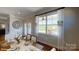 Elegant dining room with access to a patio and backyard at 112 Noah Ln, Troutman, NC 28166