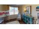 Bright and airy home office features a window seat and built-in shelving at 112 Noah Ln, Troutman, NC 28166