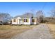 Charming house with gray roof and light-colored siding at 216 St Michael Ave, Great Falls, SC 29055