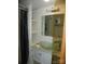 Nicely remodeled bathroom with clear glass bowl sink and great lighting at 112 S Cardinal Dr, New London, NC 28127