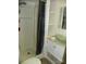 Nicely remodeled bathroom with clear glass bowl sink and shower at 112 S Cardinal Dr, New London, NC 28127