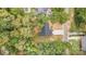 Aerial view of a newly constructed house and surrounding trees at 312 General As Johnston St, Stanley, NC 28164