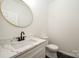 Modern bathroom with a white vanity, marble countertop, and hexagon floor tiles at 312 General As Johnston St, Stanley, NC 28164