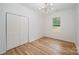 Bright bedroom with hardwood floors and double door closet at 312 General As Johnston St, Stanley, NC 28164