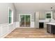 Modern kitchen with light cabinets, marble countertops, and hardwood floors at 312 General As Johnston St, Stanley, NC 28164