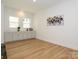 Bright breakfast area with built-in cabinetry and wood flooring at 1010 Lowland Way, Waxhaw, NC 28173