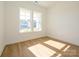 Bright and airy home office with hardwood floors and large windows at 1010 Lowland Way, Waxhaw, NC 28173