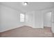 Well-lit bedroom with closet and carpeting at 129 Eden Ave, Mooresville, NC 28115