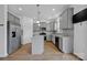 Modern kitchen with stainless steel appliances and gray cabinetry at 129 Eden Ave, Mooresville, NC 28115