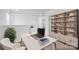 Home office with built-in shelving and desk at 129 Eden Ave, Mooresville, NC 28115