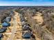 Aerial view of a residential neighborhood next to a beautiful golf course on a sunny day at 2257 Tatton Hall Rd, Fort Mill, SC 29715