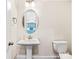 Powder room featuring a pedestal sink and modern fixtures at 2257 Tatton Hall Rd, Fort Mill, SC 29715