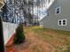 Large backyard with privacy fence at 328 Shinnville Rd, Mooresville, NC 28115