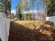 Open backyard area with privacy fence at 328 Shinnville Rd, Mooresville, NC 28115