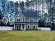 Two story house with gray siding and white trim at 328 Shinnville Rd, Mooresville, NC 28115