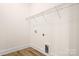 Laundry room with built-in shelving and hookups at 328 Shinnville Rd, Mooresville, NC 28115