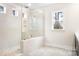 Bathroom with a glass shower enclosure at 332 Shinnville Rd, Mooresville, NC 28115