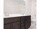 Bathroom features a double sink vanity, white countertop, and a shower-tub combo at 332 Shinnville Rd, Mooresville, NC 28115