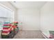 Bedroom with window and gray carpet filled with boxes at 4233 Poplin Grove Dr, Indian Trail, NC 28079