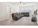 A living room with a large sofa and a television at 4233 Poplin Grove Dr, Indian Trail, NC 28079