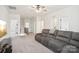 An upstairs loft area with a large sofa at 4233 Poplin Grove Dr, Indian Trail, NC 28079