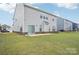 Backyard featuring a grassy yard and gray siding at 4233 Poplin Grove Dr, Indian Trail, NC 28079