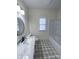 Bathroom with single vanity, patterned floor, and shower/tub combo at 409 19Th Avenue Nw Cir # 12, Hickory, NC 28601