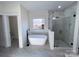 Elegant bathroom with soaking tub, walk-in shower, and modern fixtures at 409 19Th Avenue Nw Cir # 12, Hickory, NC 28601