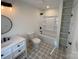 Updated bathroom with a bathtub, shower, and built-in shelving at 409 19Th Avenue Nw Cir # 12, Hickory, NC 28601