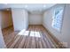 Bright bonus room with hardwood floors and a window at 409 19Th Avenue Nw Cir # 12, Hickory, NC 28601