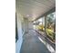 Spacious covered porch with white columns and views of the neighborhood at 409 19Th Avenue Nw Cir # 12, Hickory, NC 28601