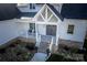 Charming two-story home with gray door and brick steps at 409 19Th Avenue Nw Cir # 12, Hickory, NC 28601