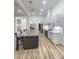 Open concept kitchen with granite countertops and modern cabinetry at 409 19Th Avenue Nw Cir # 12, Hickory, NC 28601