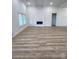 Living room with hardwood floors and a modern fireplace at 409 19Th Avenue Nw Cir # 12, Hickory, NC 28601