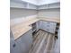 Large pantry with white cabinets and a butcher block countertop at 409 19Th Avenue Nw Cir # 12, Hickory, NC 28601
