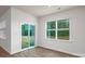 Dining area with sliding glass door to patio and wood-look floors at 225 Brinkley Rd # 99, Kings Mountain, NC 28086