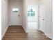 Bright entryway with vinyl plank flooring and access to other rooms at 225 Brinkley Rd # 99, Kings Mountain, NC 28086