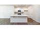 Modern kitchen with white cabinets, quartz countertops, and an island at 225 Brinkley Rd # 99, Kings Mountain, NC 28086