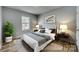 Serene bedroom featuring stylish décor, a comfortable bed, and a large window at 337 Friendship Dr, Rock Hill, SC 29730