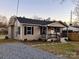 Well-maintained home with gravel driveway, neat landscaping, and inviting front porch at 337 Friendship Dr, Rock Hill, SC 29730