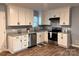 Updated kitchen featuring white cabinets, stainless steel appliances, and granite countertops at 337 Friendship Dr, Rock Hill, SC 29730