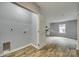 Laundry room with washer/dryer hookups, leading to an open living area with wood-look flooring at 337 Friendship Dr, Rock Hill, SC 29730