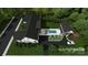 Bird's-eye view showing house, pool, and backyard at 419 South St # 32, Davidson, NC 28036