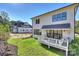 View of newly constructed home with a well-maintained backyard and wooden deck at 5022 Ohm Ln, Charlotte, NC 28270