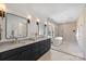 Modern bathroom with double vanity, soaking tub, and glass-enclosed shower at 5022 Ohm Ln, Charlotte, NC 28270